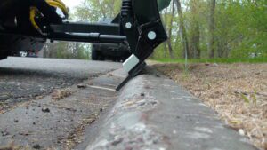 Trip Edge Plow on Curb