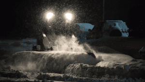 Kage SnowFire Rolling Snow on Bobcat Skid Steer