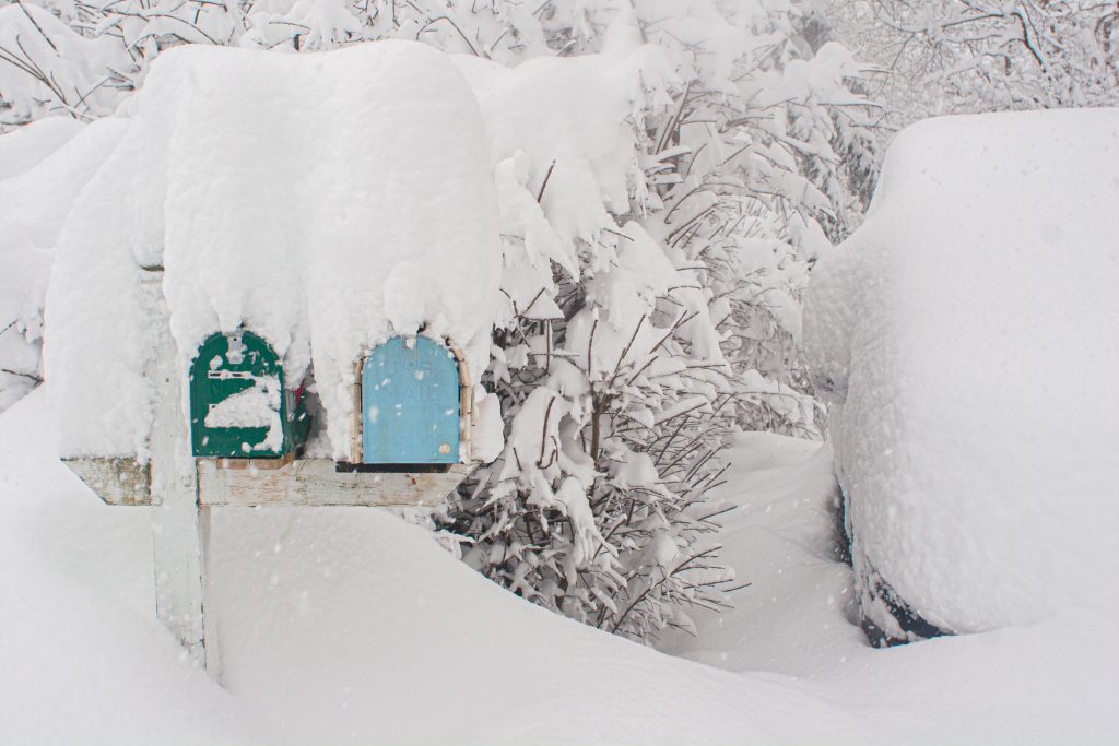 snow covered mailboxes