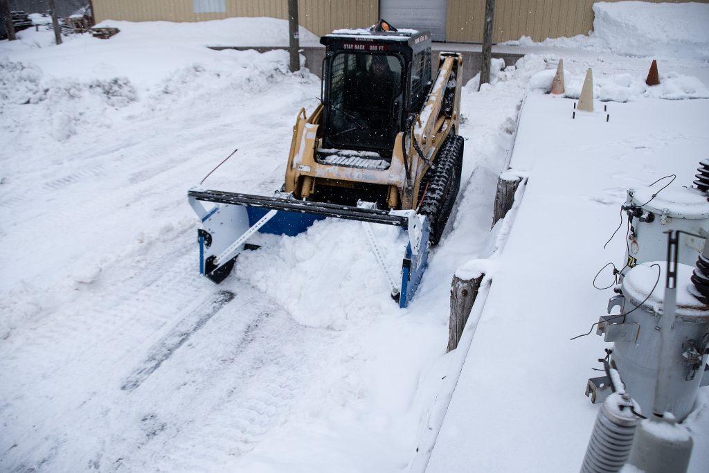 Pushing Snow From Loading Dock with SnowFire BLAST Snow Pusher