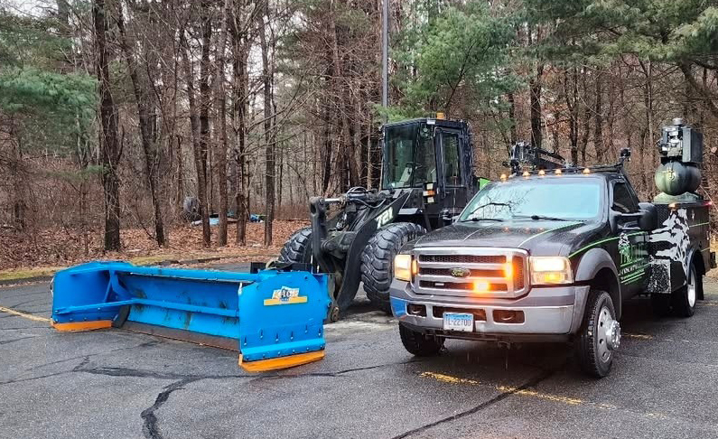 Trucut 14 foot SnowStorm on Case 721 wheel loader