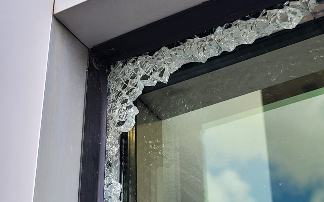 Combating the Hazards of Mowing Near Windows With Chute Blockers